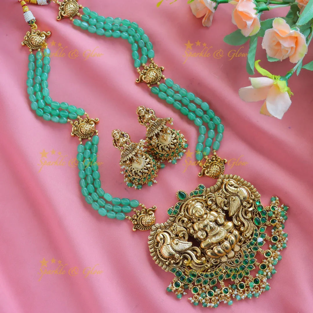 Grand Kemp Idol Lakshmi Peacock Floral pendant Haram with multilayered mintgreen beads-Green - Sparkle and Glow
