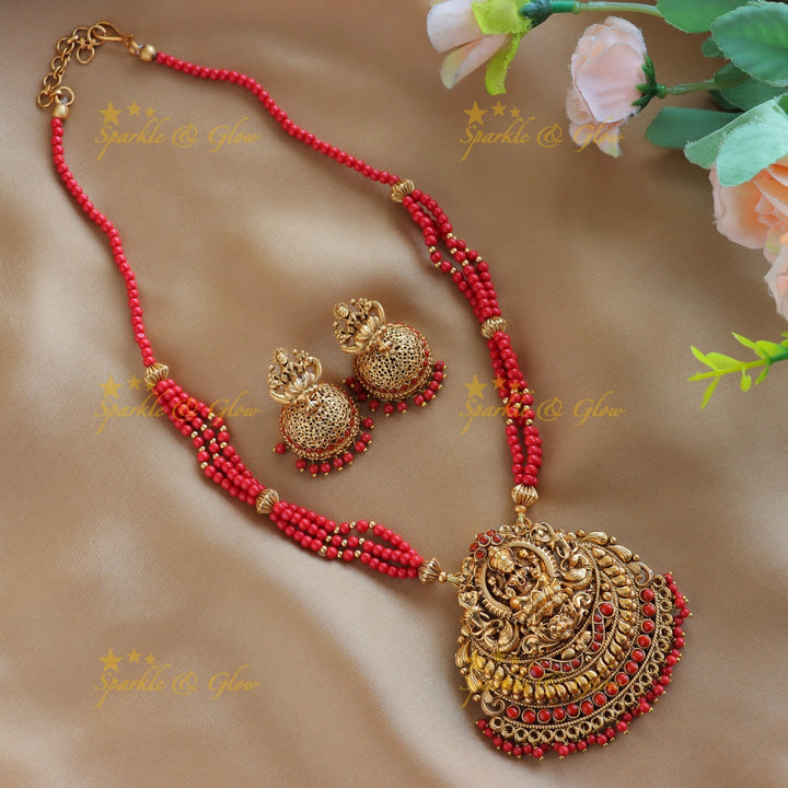 Sparkling Idol Lakshmi Peacock pendant carved Coral beaded Haram