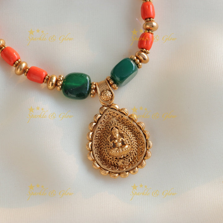Statement Idol Lakshmi pendant carved short necklace with coral and green beads