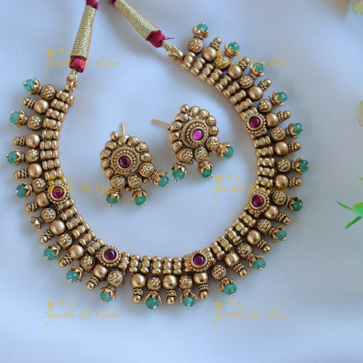 Statement Floral non idol short necklace with green beads