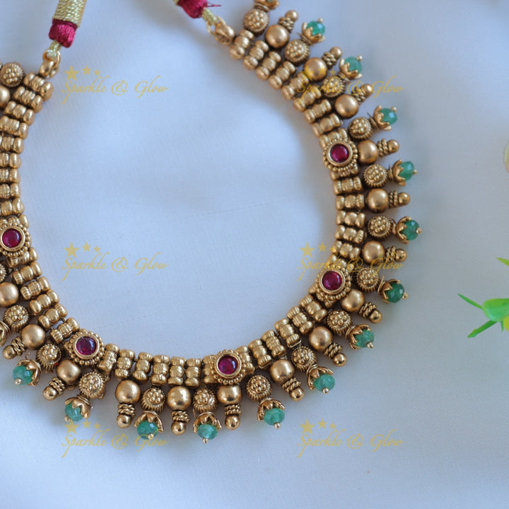 Statement Floral non idol short necklace with green beads
