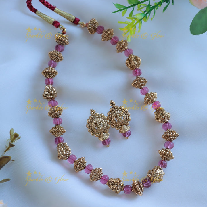 Gracious Idol Lakshmi and gold ball beaded short necklace