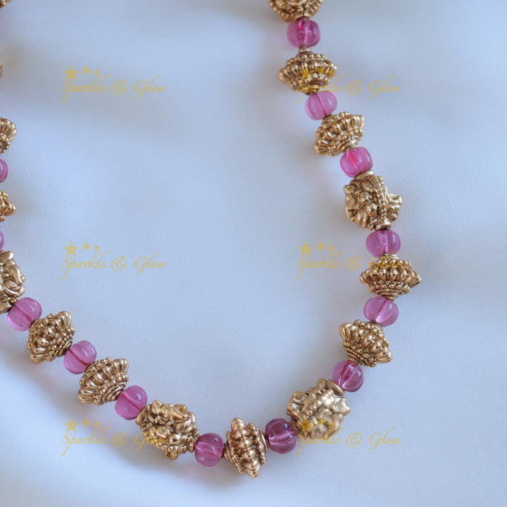 Gracious Idol Lakshmi and gold ball beaded short necklace