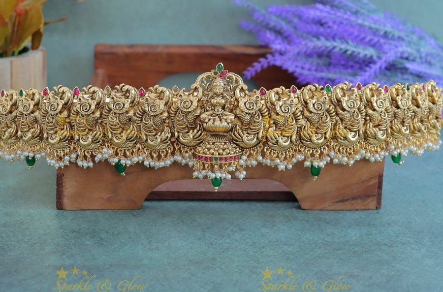Grand Idol Lakshmi dancing peacock carved Hipbelt with pearls and green beads - Sparkle and Glow - 