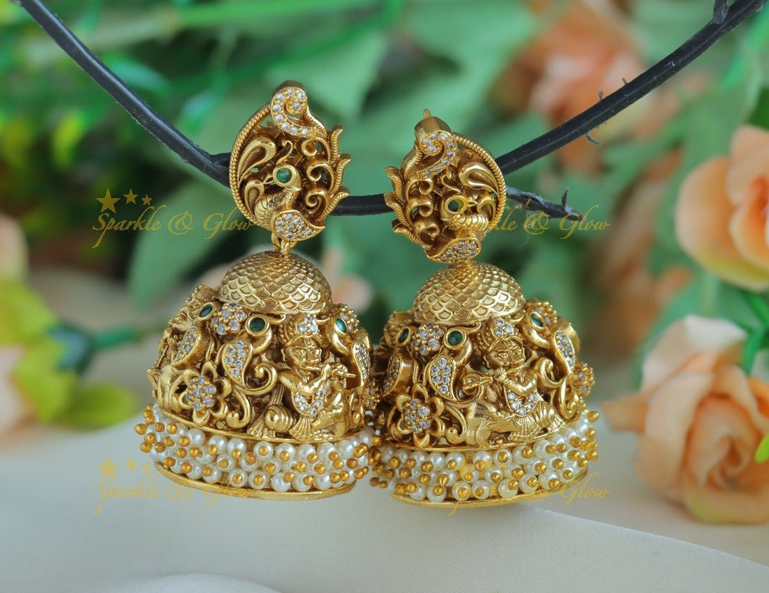 Beautiful Idol Flute Krishna carved Peacock Jhumka - Sparkle and Glow - 