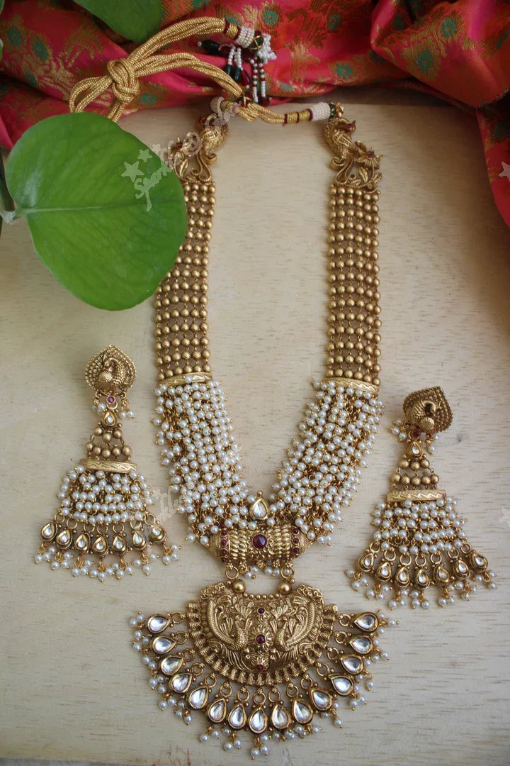 Statement gold bead cluster kundan stone peacock carved pendent haram - Sparkle and Glow