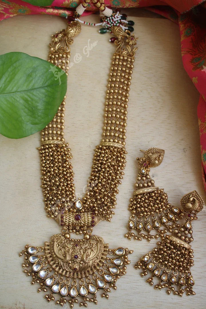 Statement gold bead cluster kundan stone peacock carved pendent haram - Sparkle and Glow