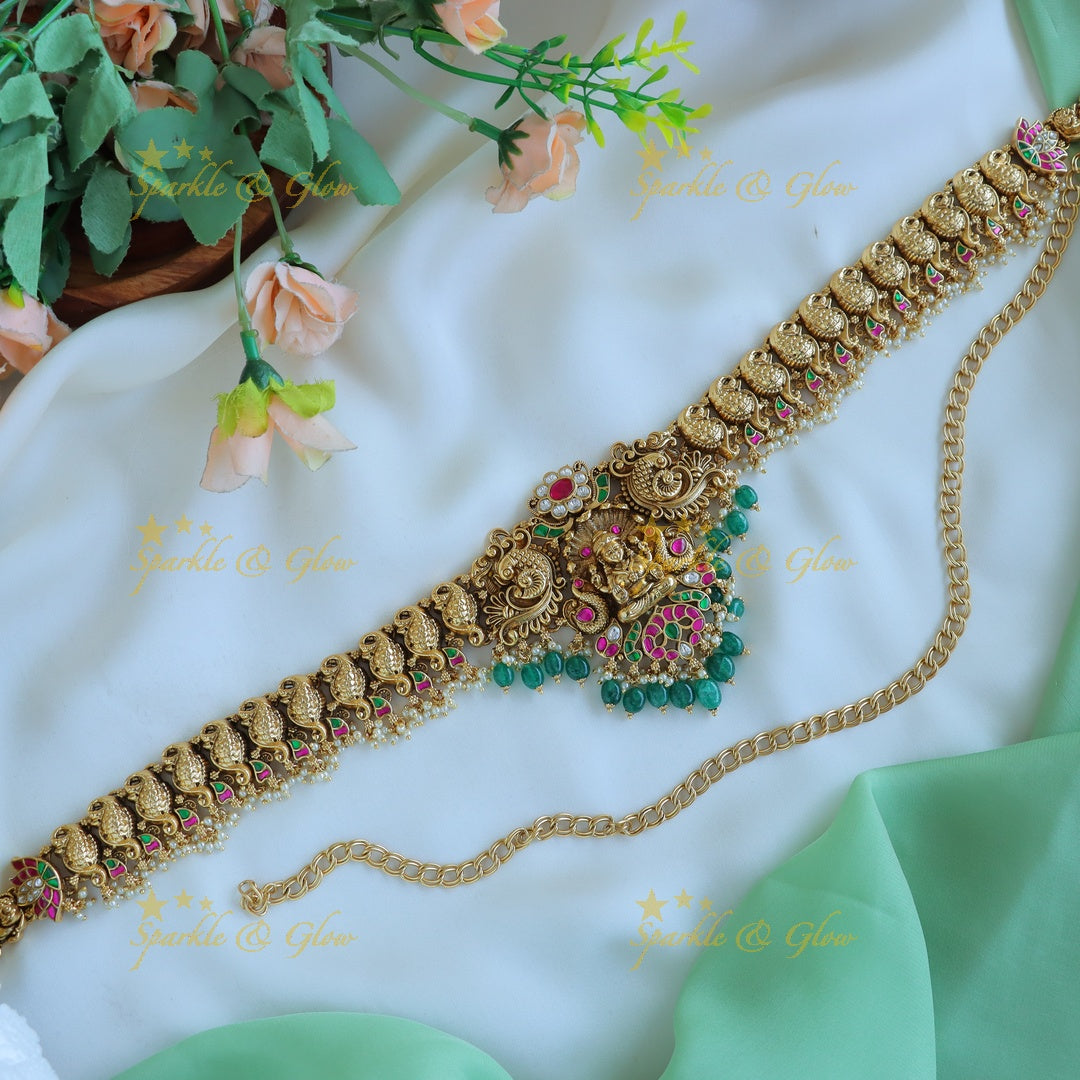 Grand Idol jadau Lakshmi Peacock carved Hipchain with Green beads