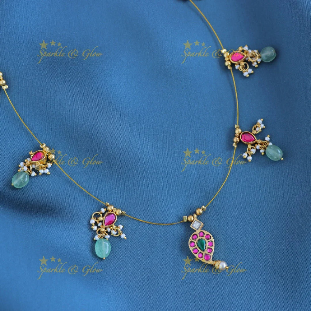 Gracious Mango Floral Invisible short necklace with mintgreen beads - Sparkle and Glow