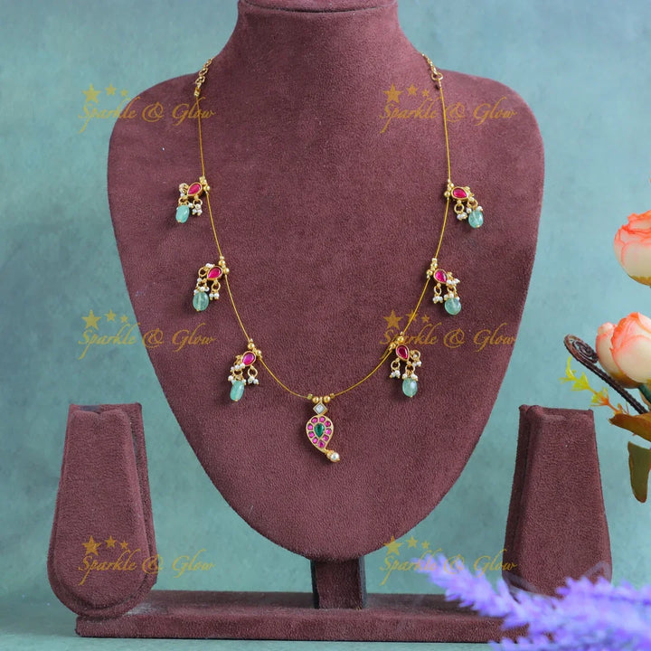 Gracious Mango Floral Invisible short necklace with mintgreen beads - Sparkle and Glow