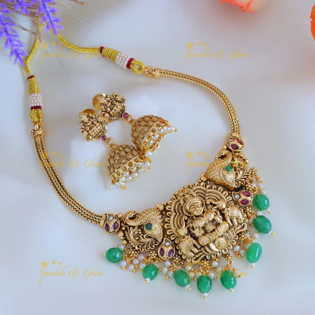 Elegant Idol Lakshmi Elephant Peacock carved choker with gold beads - Sparkle and Glow