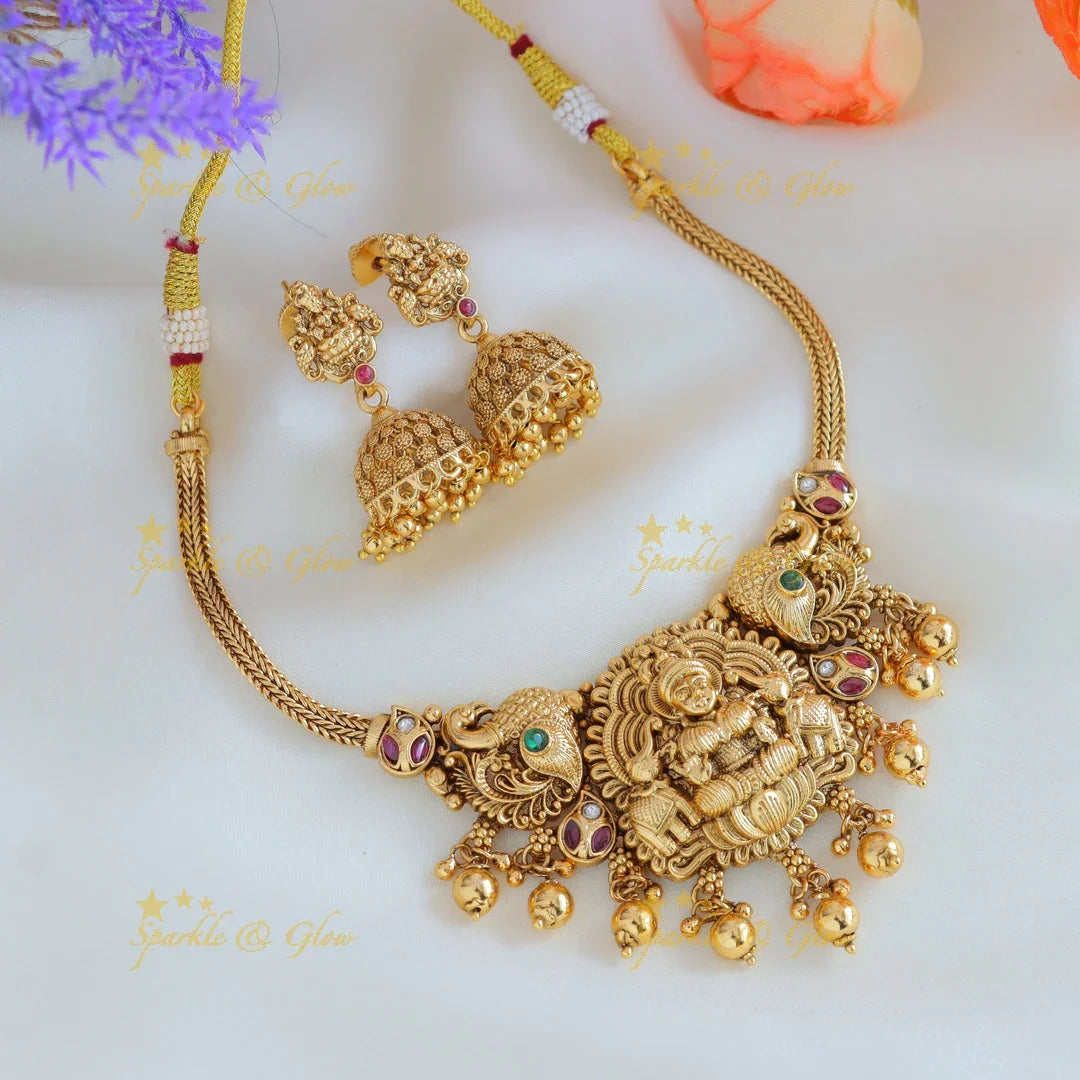 Elegant Idol Lakshmi Elephant Peacock carved choker with gold beads - Sparkle and Glow
