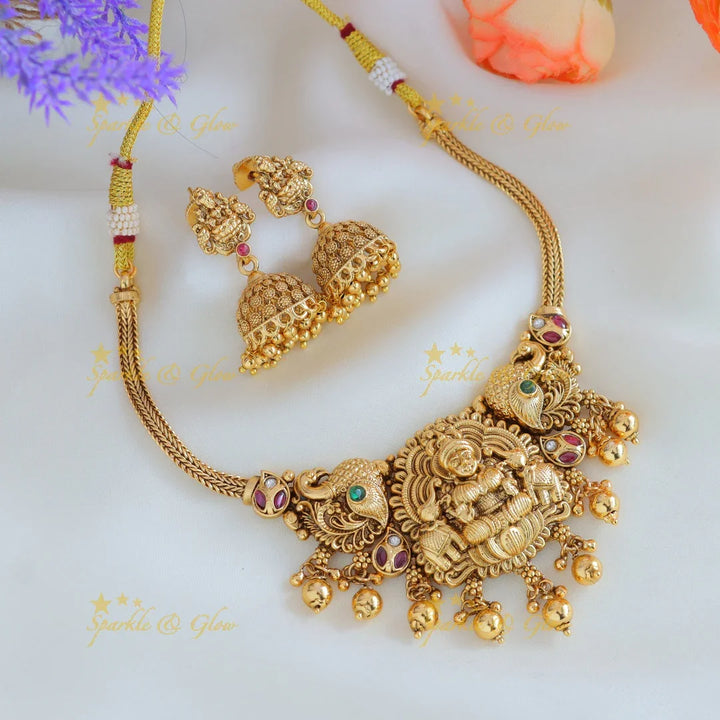 Elegant Idol Lakshmi Elephant Peacock carved choker with gold beads - Sparkle and Glow