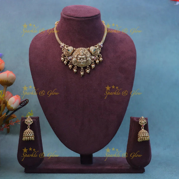 Elegant Idol Lakshmi Elephant Peacock carved choker with gold beads - Sparkle and Glow