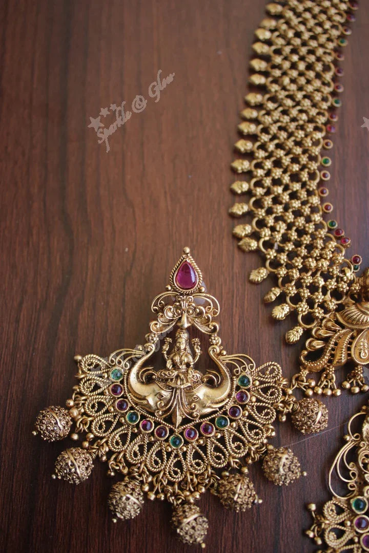 Statement gold alike polished Lakshmi haram - Sparkle and Glow