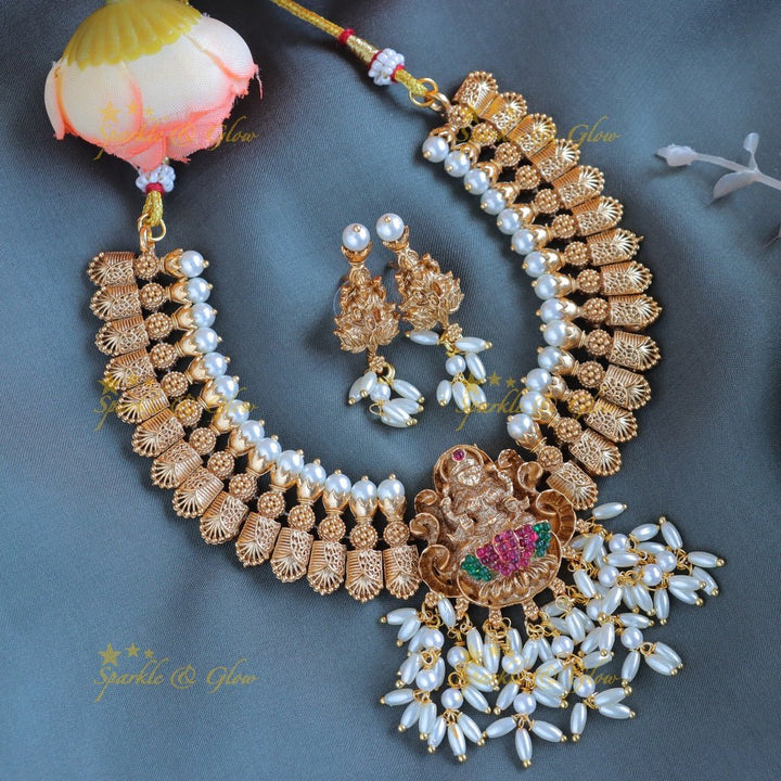 Sparkling Idol Lakshmi goemetric carved short necklace with rice pearls - Sparkle and Glow - Back Thread - 