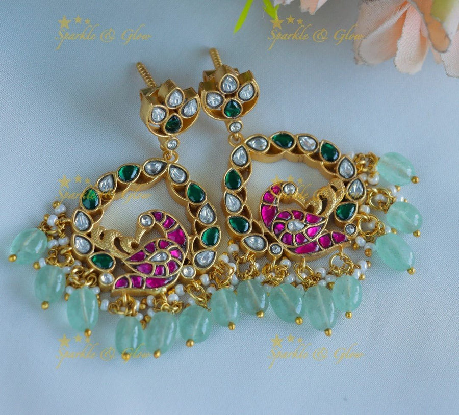 Gracious Oval Floral Peacock carved Jadau Kundan Chandbali - Sparkle and Glow - 