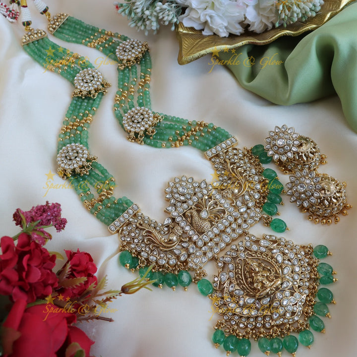 Stunning mint green and kundan stones floral peacock design long haram - white