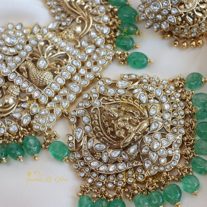Stunning mint green and kundan stones floral peacock design long haram - white