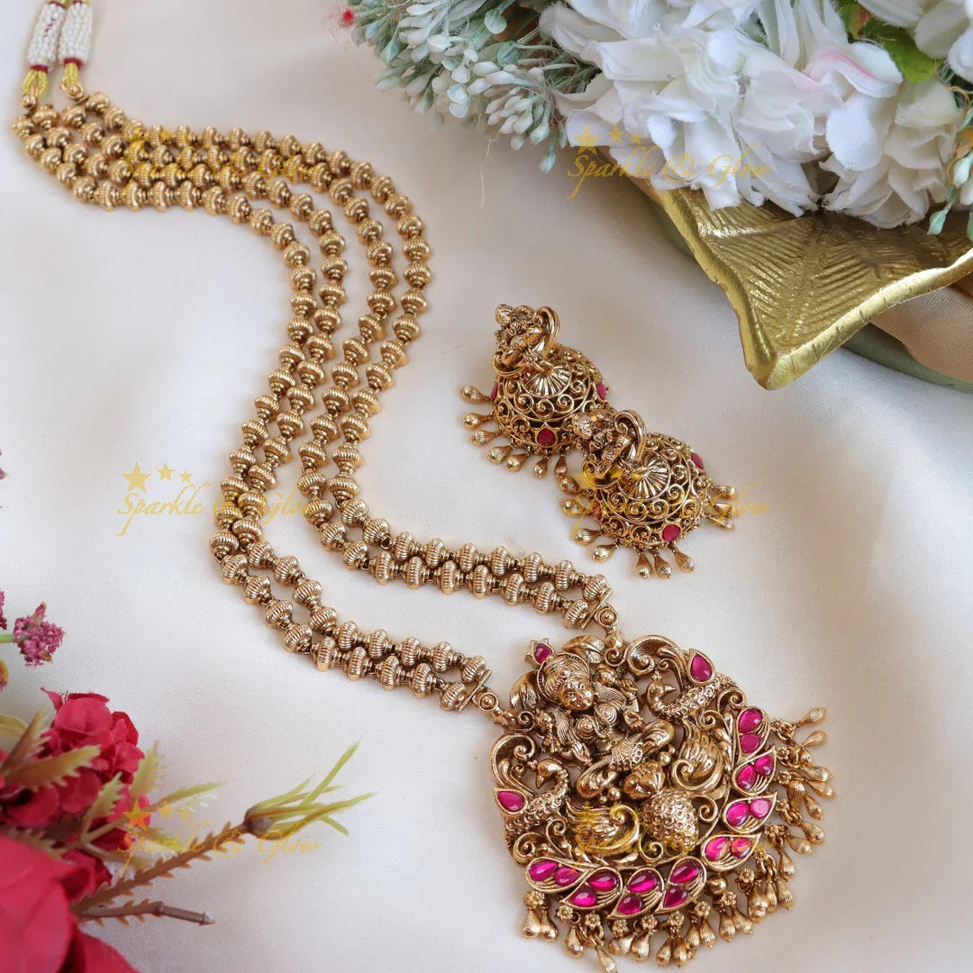 Elegant lakshmi and peacock design with gold beads long haram - pink,green - Sparkle and Glow