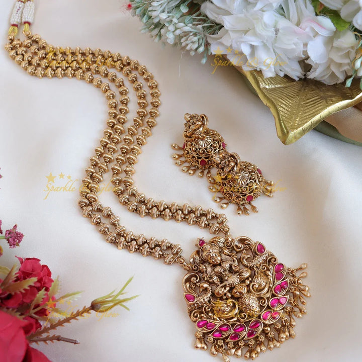 Elegant lakshmi and peacock design with gold beads long haram - pink,green - Sparkle and Glow