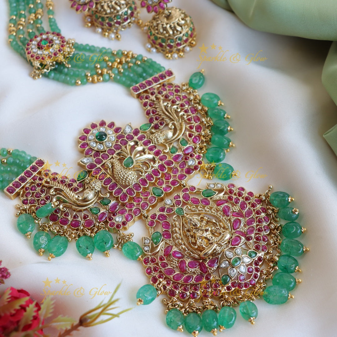 Stunning mint green and kundan stones floral peacock design long haram - Pink