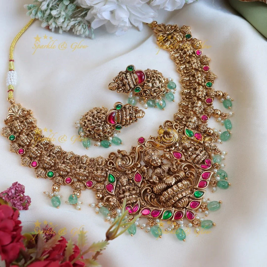 Beautiful Jadau lakshmi and peacock design with mint green beads short necklace - Sparkle and Glow
