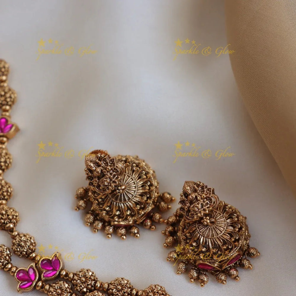 Pretty dancing peacock and Lakshmi design long necklace - Sparkle and Glow