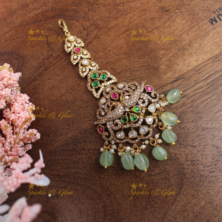 Gracious Peacock Leaf Floral Victorian AD Maangtikka - Green - Sparkle and Glow - Mintgreen - 