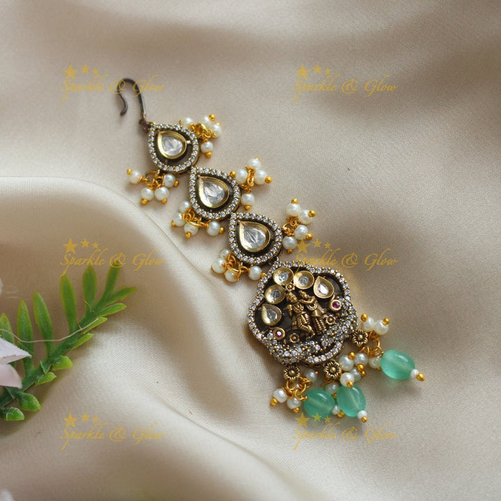 Gracious Idol Radhakrishna carved Victorian AD kundan maangtikka - Red - Sparkle and Glow - Mintgreen - 