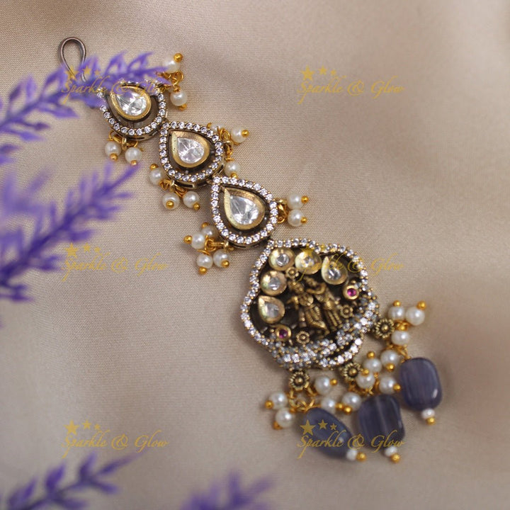 Gracious Idol Radhakrishna carved Victorian AD kundan maangtikka - Red - Sparkle and Glow - Purple - 