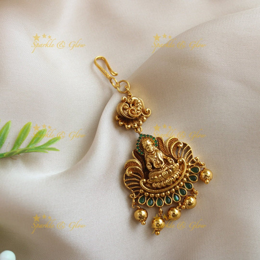 Beautiful Idol Lakshmi peacock carved kemp Maangtikka - Sparkle and Glow - 