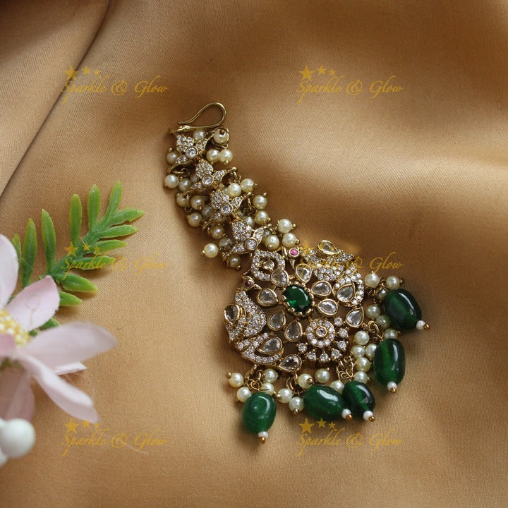 Elegant Dual tone Peacock Floral carved Victorian AD maangtikka - Green - Sparkle and Glow - Green - 