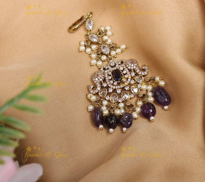 Sparkling Dual tone Elephant Floral Guttapusalu Victorian AD Maangtikka - Sky blue - Sparkle and Glow - Purple - 