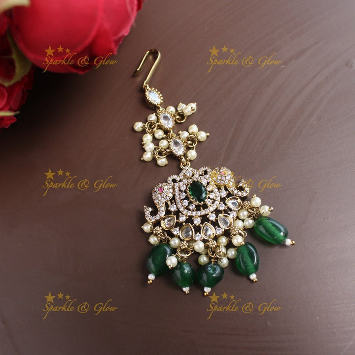 Sparkling Dual tone Elephant Floral Guttapusalu Victorian AD Maangtikka - Sky blue - Sparkle and Glow - Green - 