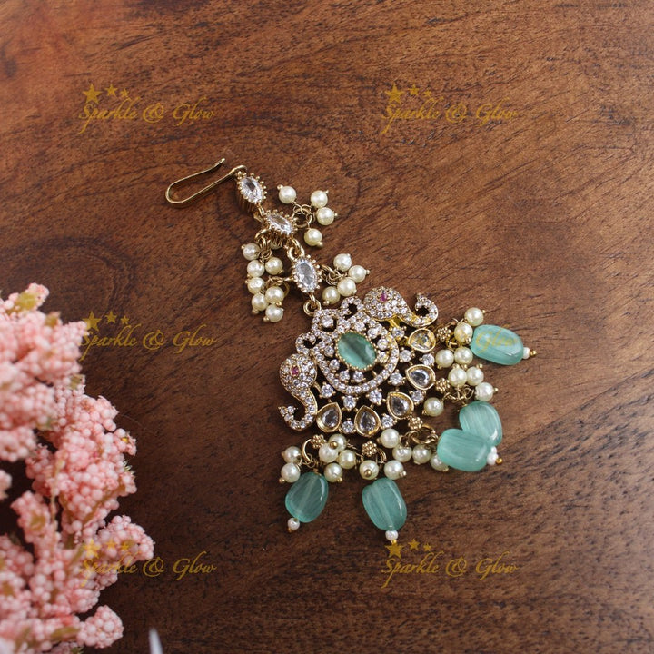 Sparkling Dual tone Elephant Floral Guttapusalu Victorian AD Maangtikka - Sky blue - Sparkle and Glow - sky blue1 - 
