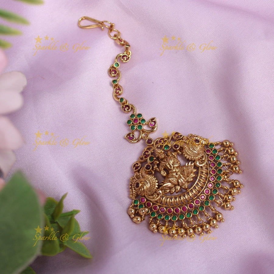 Beautiful Kemp Lakshmi Peacock carved Single line Maangtikka - Sparkle and Glow - 