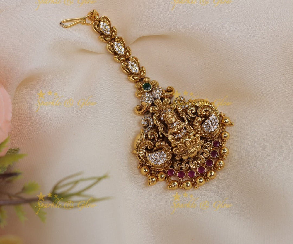 Stunning Lakshmi Peacock Floral Maangtikka with gold beads - Sparkle and Glow - 