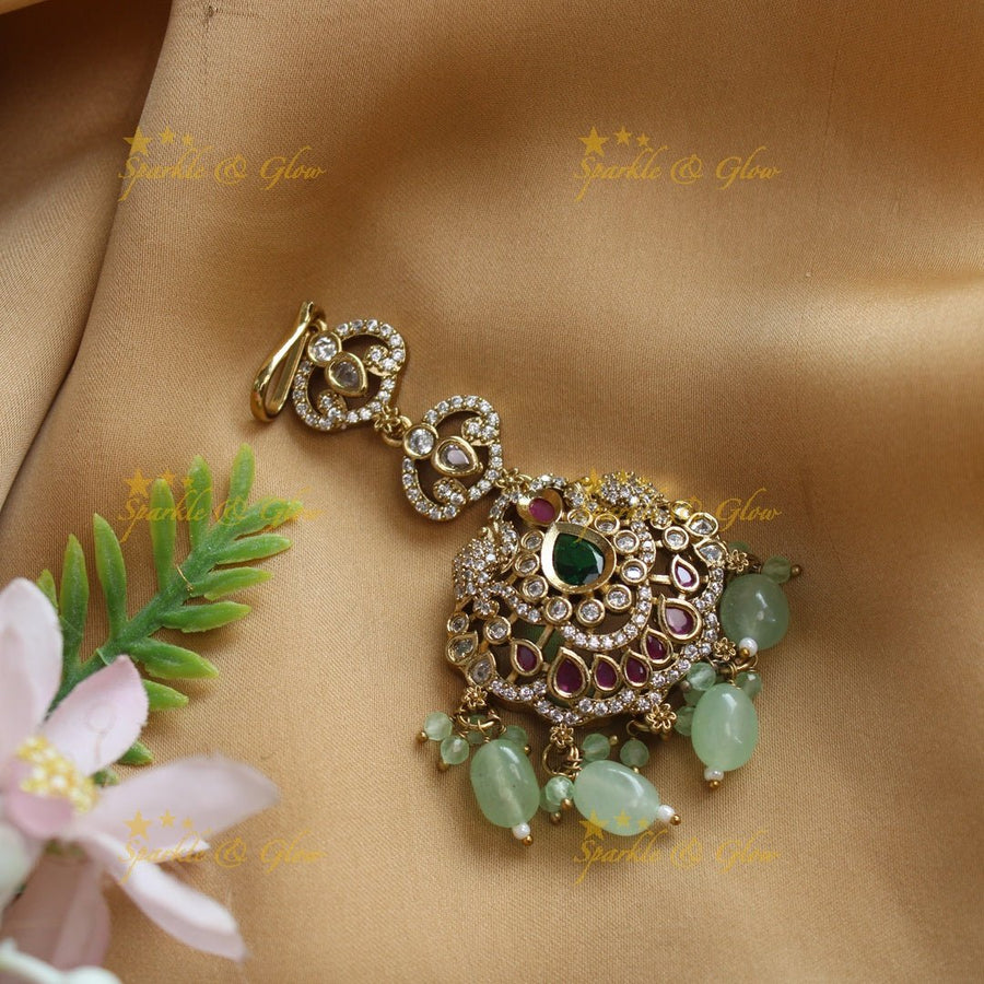 Elegant Victorian AD Floral Maangtikka with kundan stones - Purple - Sparkle and Glow - Mintgreen - 