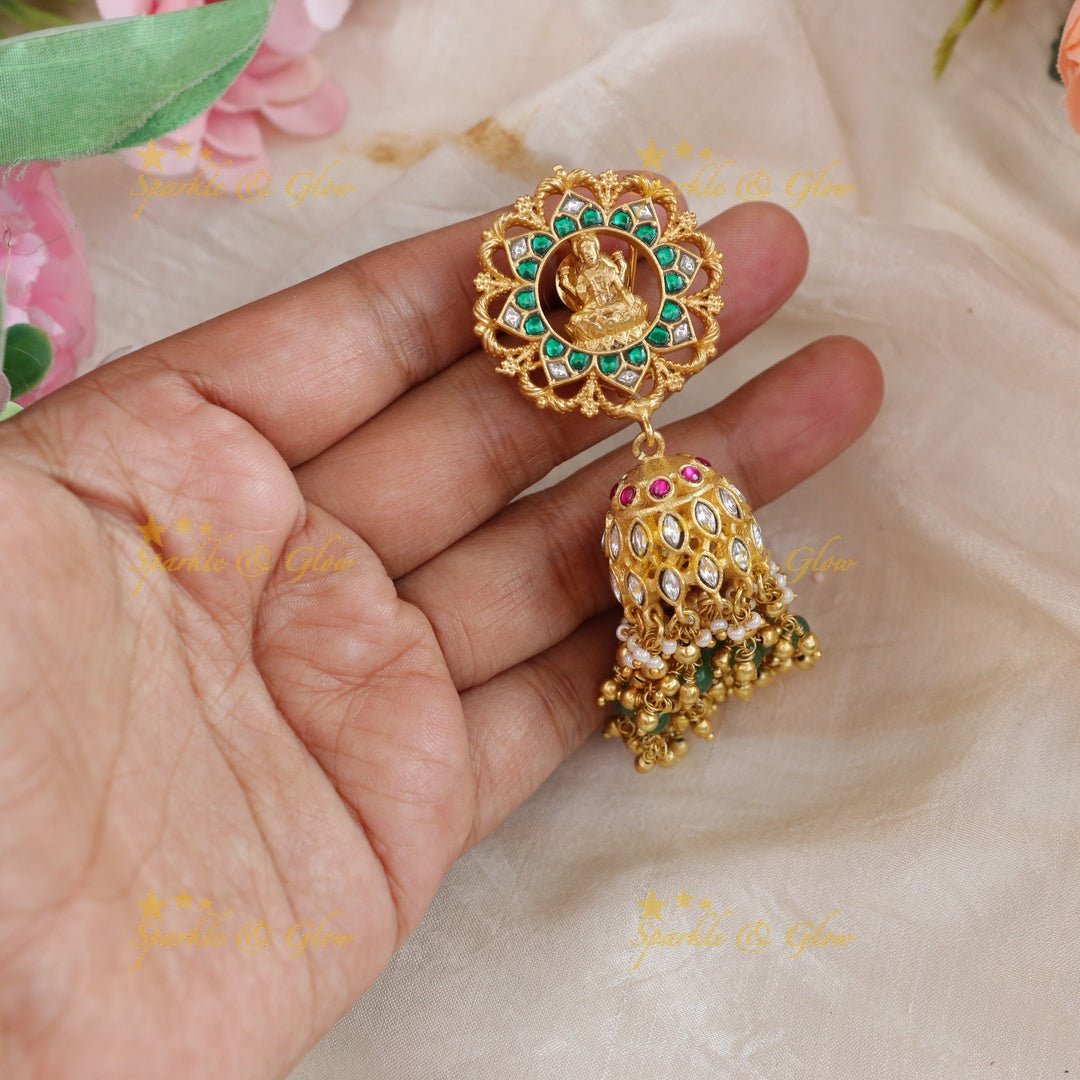 Gracious Idol Lakshmi Floral carved Jadau jhumukas with green and gold beads - Sparkle and Glow - 