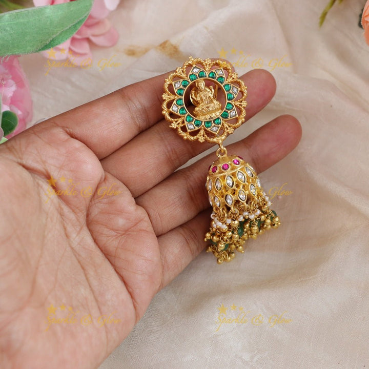Gracious Idol Lakshmi Floral carved Jadau jhumukas with green and gold beads - Sparkle and Glow - 