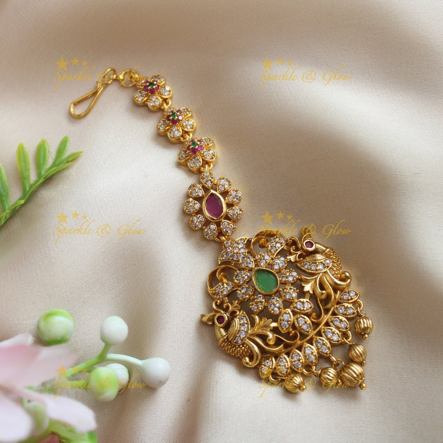Statement Kemp Peacock Floral carved maangtikka with AD stones - Sparkle and Glow - 