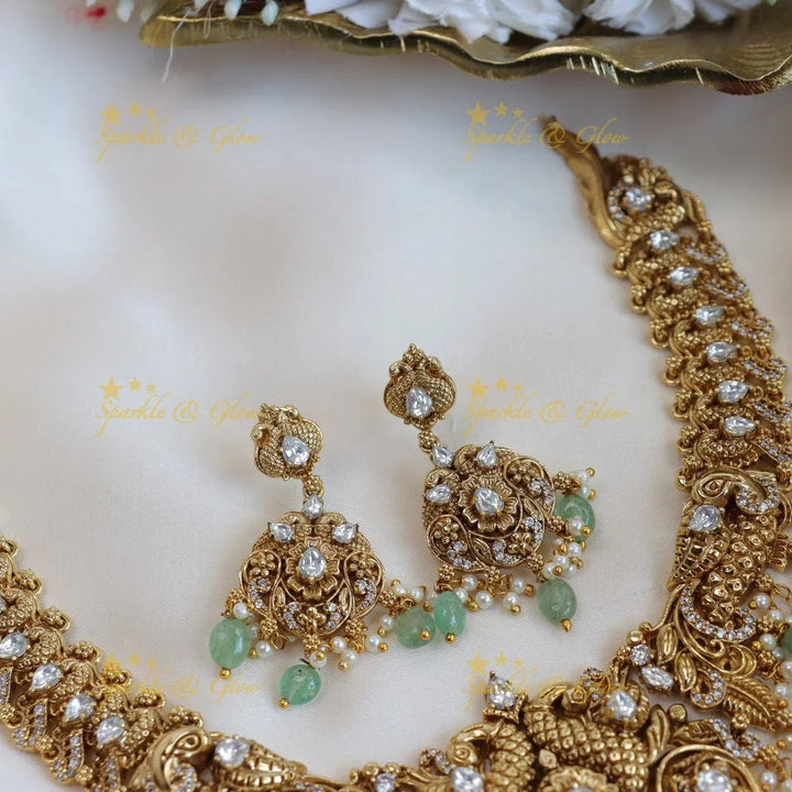 Elegant peacock and floral design short necklace with pearl and mint green beads - Sparkle and Glow