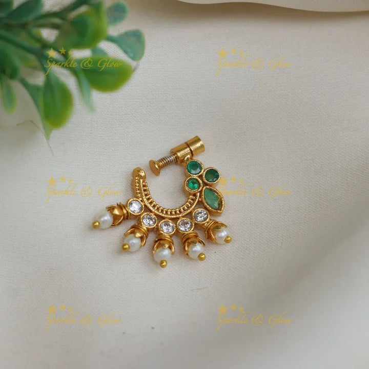 Gold alike polished green and white AD stones nose pin - Sparkle and Glow