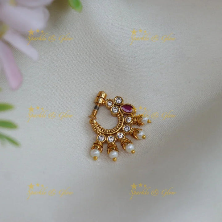 Gold alike polished green and white AD stones nose pin - Sparkle and Glow