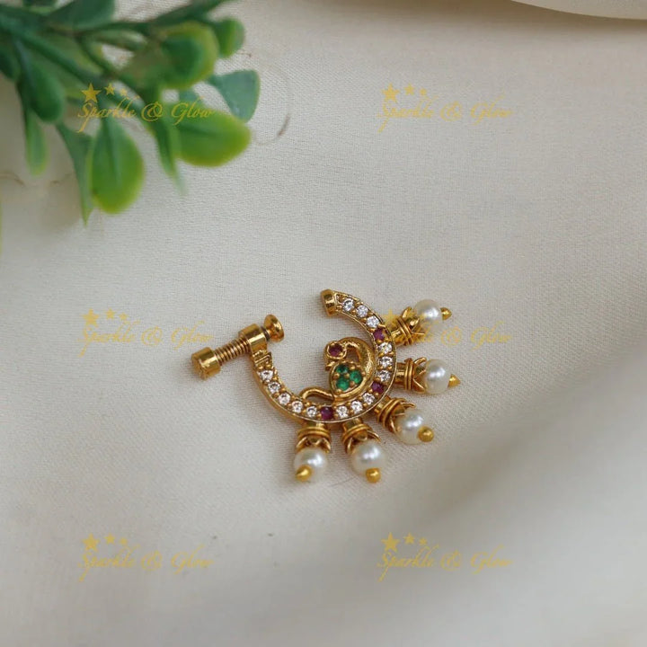 Beautiful pink and white peacock design nose pin - Sparkle and Glow