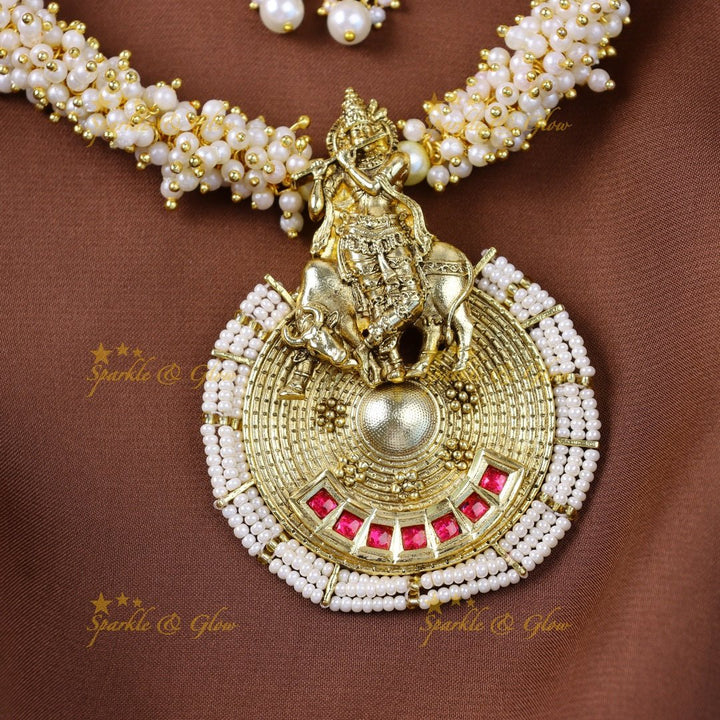 Elegant Idol Flute Krishna pendant carved pearl cluster short necklace - Sparkle and Glow - Back Thread - 