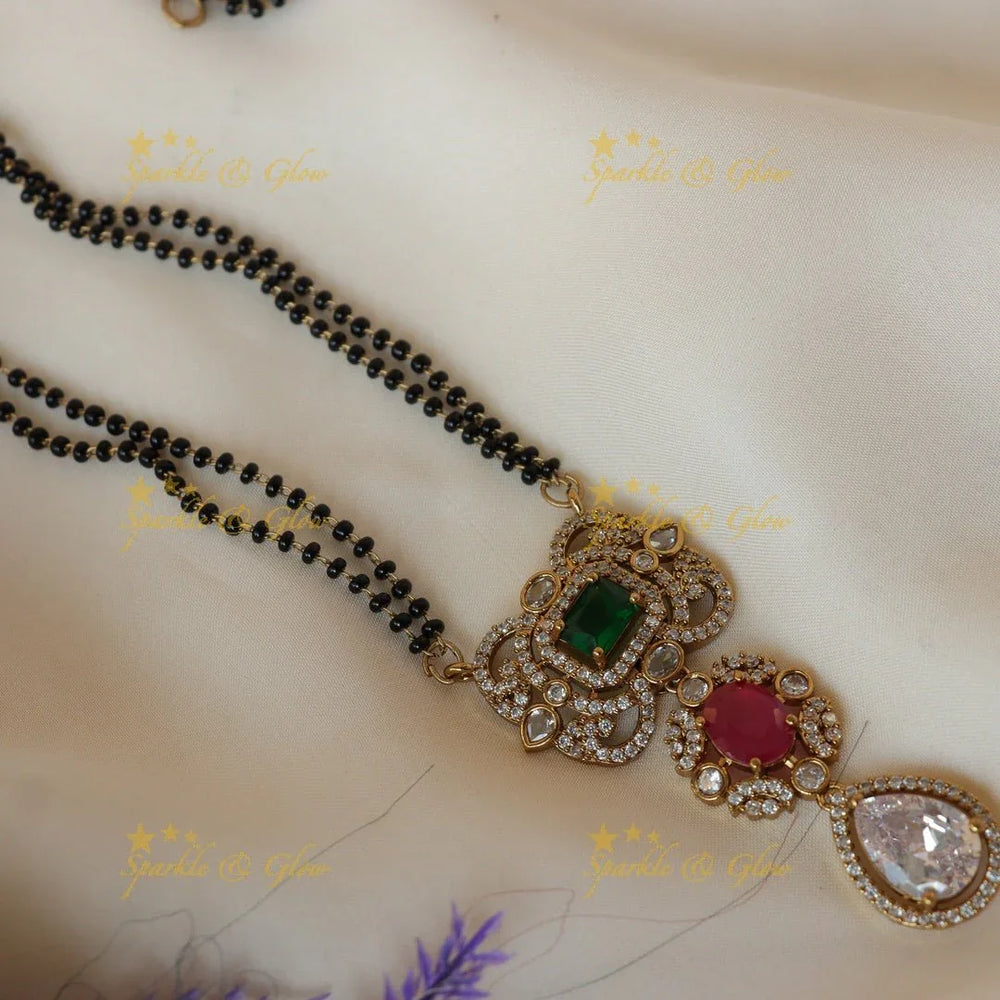 Pretty green red and white stones pendant mangalsuthra / black beads chain - Sparkle and Glow