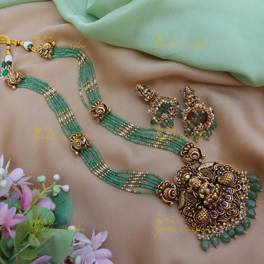 Pretty lakshmi and peacock design Mint green beads long necklace - Sparkle and Glow - Back Thread - 