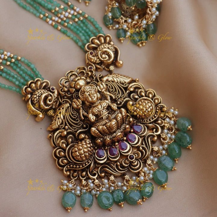 Pretty lakshmi and peacock design Mint green beads long necklace - Sparkle and Glow - Back Thread - 